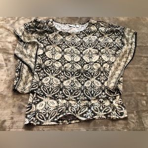 Cream/tan and black blouse from Kim Rogers. Size medium.